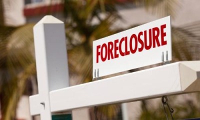 foreclosure-sign-palm-tree-background_573x300
